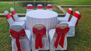 เช่าโต๊ะ-โต๊ะจีน1.5ม.เก้าอี้บุนวมคลุมผ้าขาวโบว์สีแดง